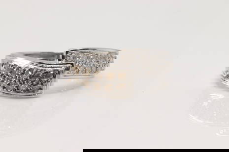 Wedding Champagne Diamond Ring 10Kt.: 10Kt White Gold Wedding Champagne Diamond Ring. This elegant ring has 24 round Champagne and white diamonds. Diamonds weight approx: 0.55ctw. Ring size: 8.25. Total weight: 3.40 Grams.