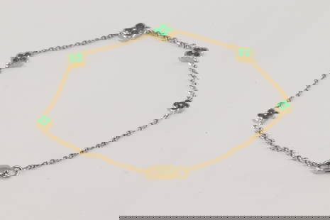 Emerald Flower Bracelet Link 14Kt.: 14Kt Yellow Gold Emerald Flower Bracelet Link. This Bracelet has Flower Deisgn with 20 Green Emeralds. Emeralds weight: 0.41ctw. Bracelet length: 8.00"