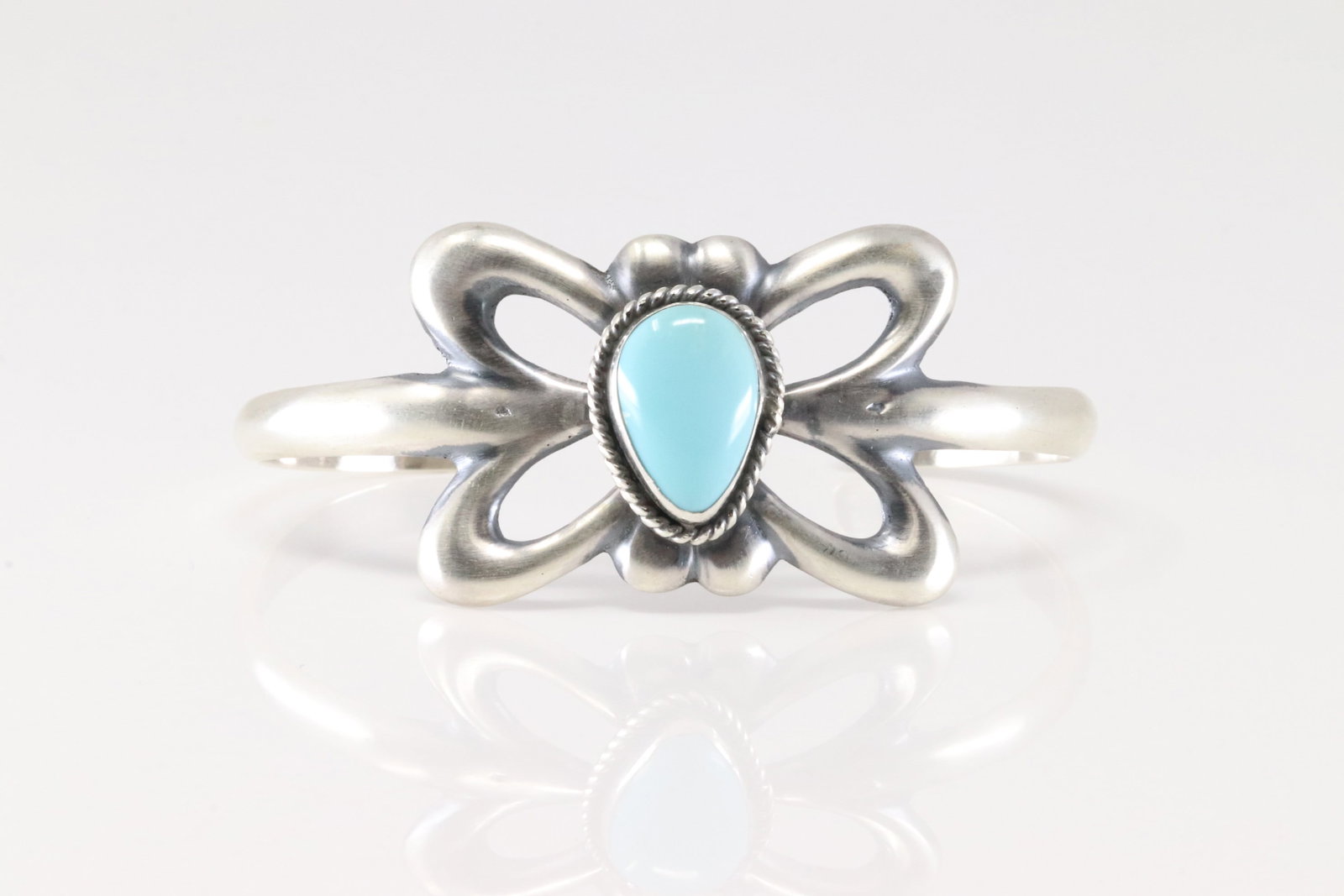 Native America Navajo Sterling Silver Turquoise Bracelet Cuff By Rena Begay.: This is a Native America Navajo Sterling Silver Turquoise Bracelet Cuff By Rena Begay.