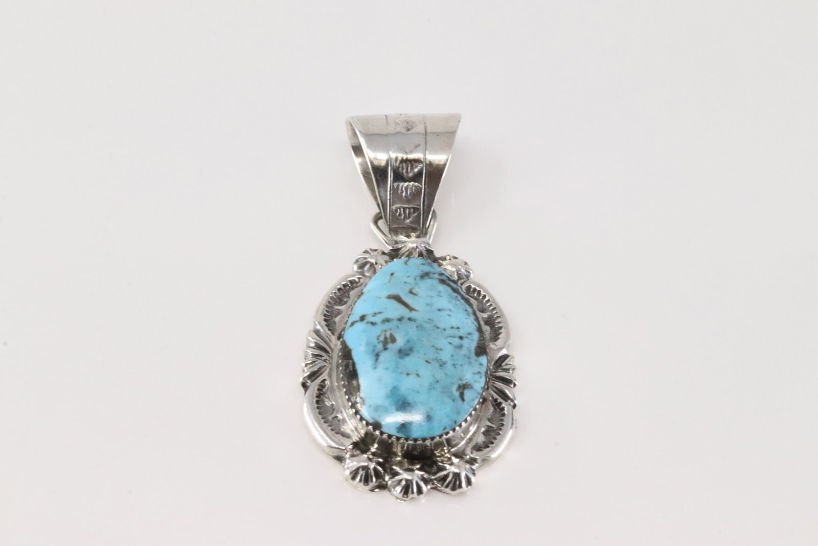 Native America Navajo Sterling Silver Turquoise Pendant By Leroy Silversmith.: This is a Native America Navajo Sterling Silver Turquoise Pendant By Leroy Silversmith.