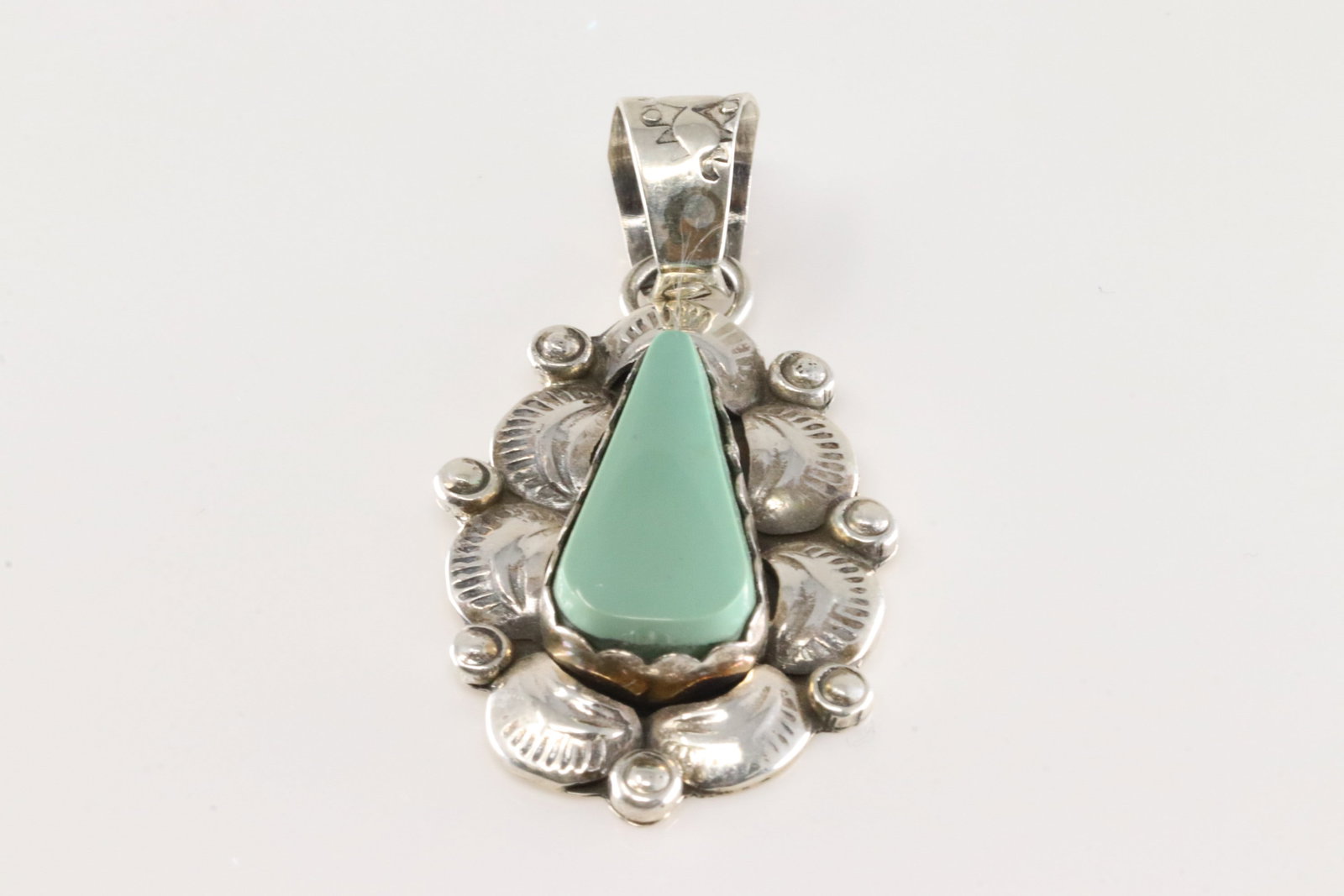 Native America Navajo Sterling Silver Turquoise Pendant By Gilbert Tom.: This is a Native America Navajo Sterling Silver Turquoise Pendant By Gilbert Tom.