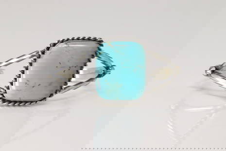 Native America Navajo Sterling Silver Kingman Turquoise Bracelet Cuff By Augustine Largo.: This is a Native America Navajo Sterling Silver Kingman Turquoise Bracelet Cuff By Augustine Largo.
