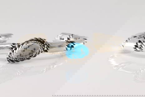 Native America Navajo Sterling Silver Kingman Turquoise Bracelet Cuff By P.T.C.: This is a Native America Navajo Sterling Silver Kingman Turquoise Bracelet Cuff By P.T.C.