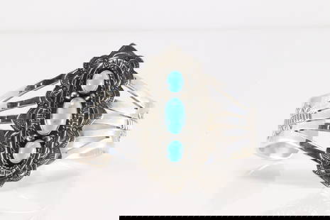 Native American Navajo Sterling Silver Turquoise Bracelet Cuff By E.Wylie.: This is a Native American Navajo Sterling Silver Turquoise Bracelet Cuff By E.Wylie.