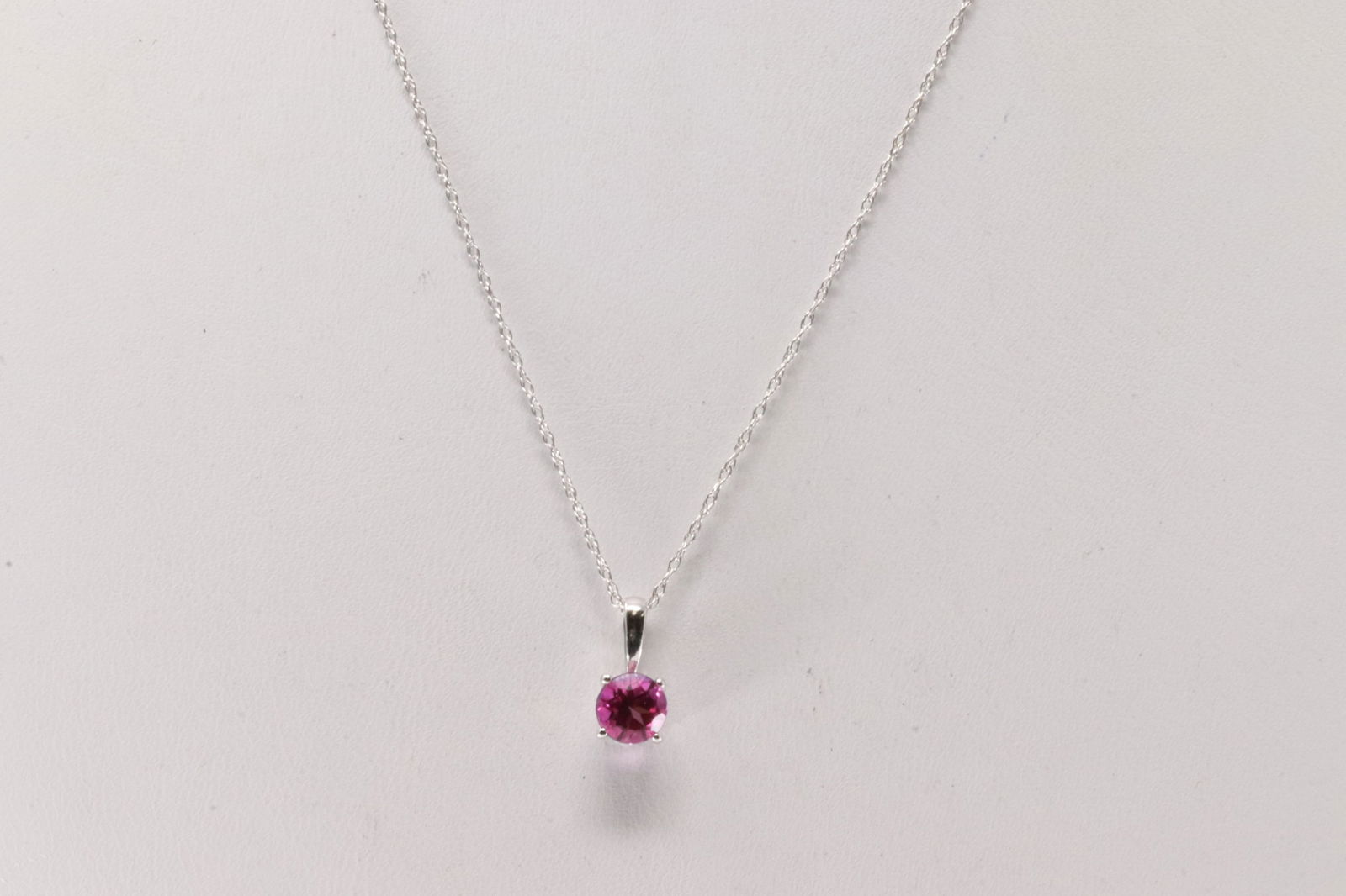Pink Topaz Pendant / Necklace 10Kt.: Ladies 10Kt White Gold Pink Topaz Pendant / Necklace. This Necklace has pendant with Pink Topaz. Necklace length: 16.00"