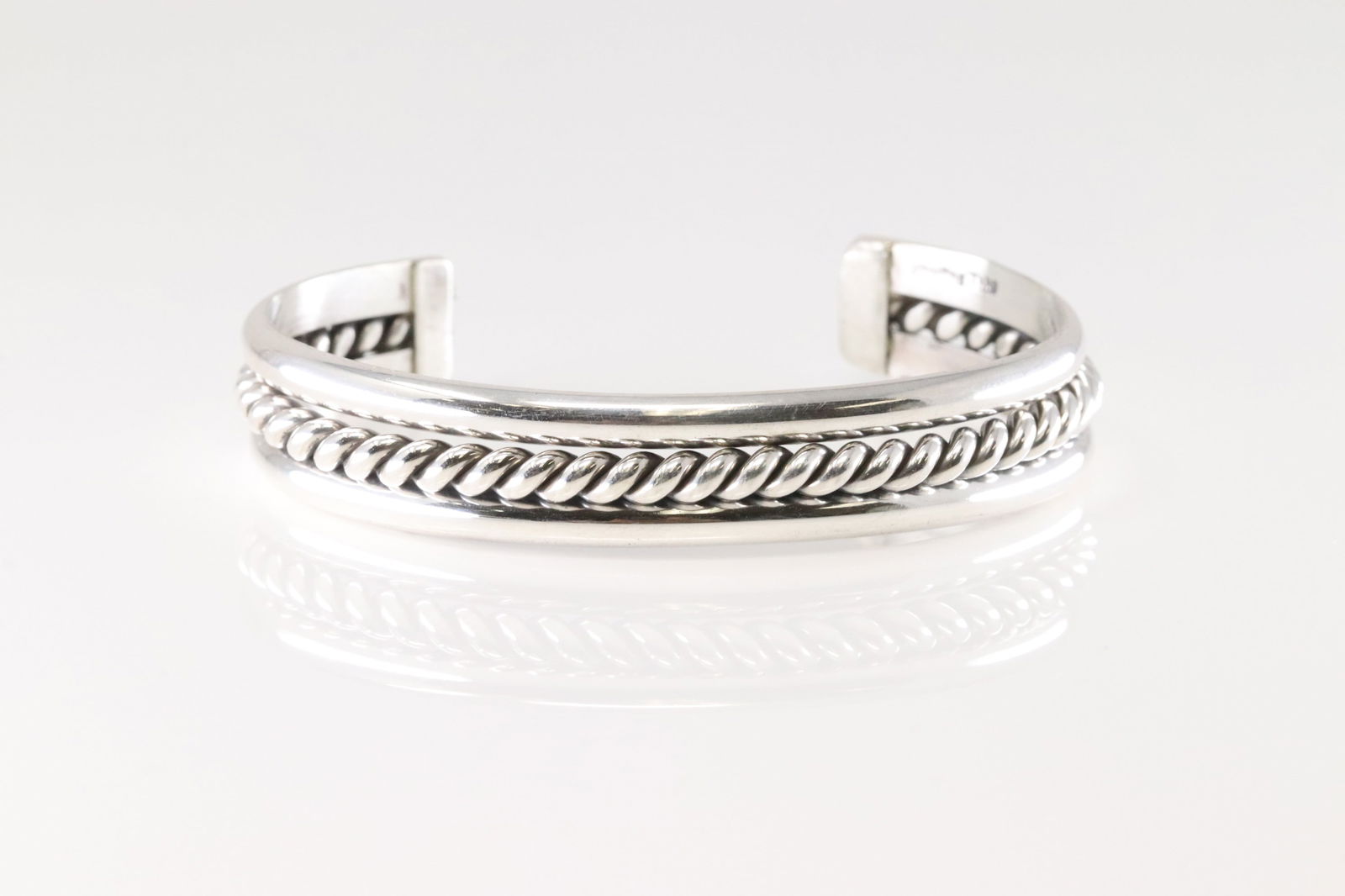 Native America Navajo Sterling Silver Solid Bracelet Cuff By Elaine Tahe.: This is a Native America Navajo Sterling Silver Solid Bracelet Cuff By Elaine Tahe.