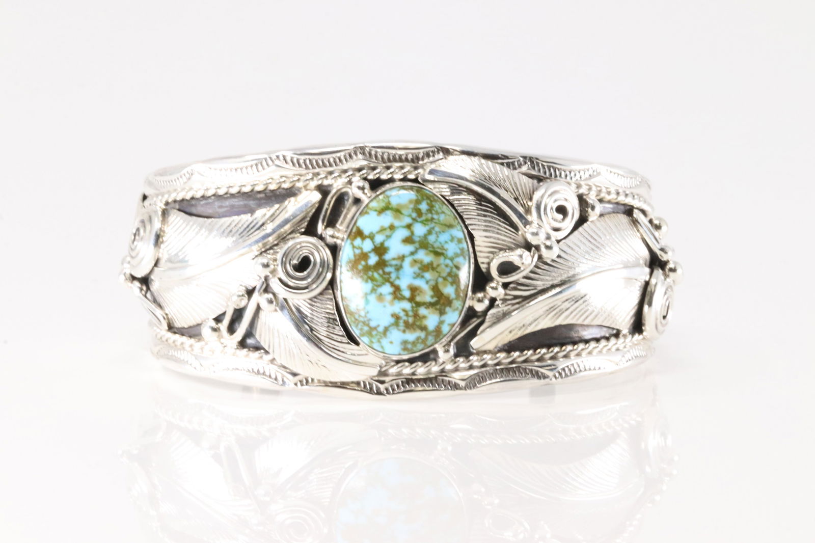Native America Navajo Sterling Silver Turquoise Cuff Bracelet By Darrell Morgan.: This is a Native America Navajo Sterling Silver Turquoise Cuff Bracelet By Darrell Morgan.