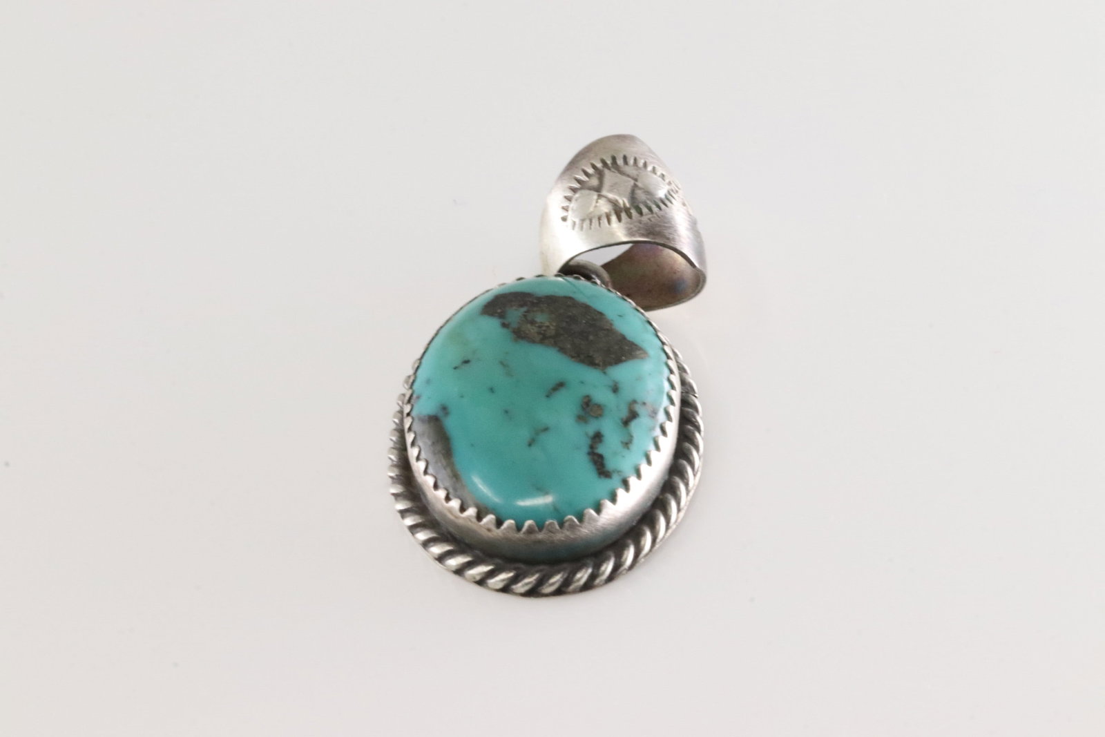 Native America Navajo Sterling Silver Turquoise Pendant By F.: This is a Native America Navajo Sterling Silver Turquoise Pendant By F.