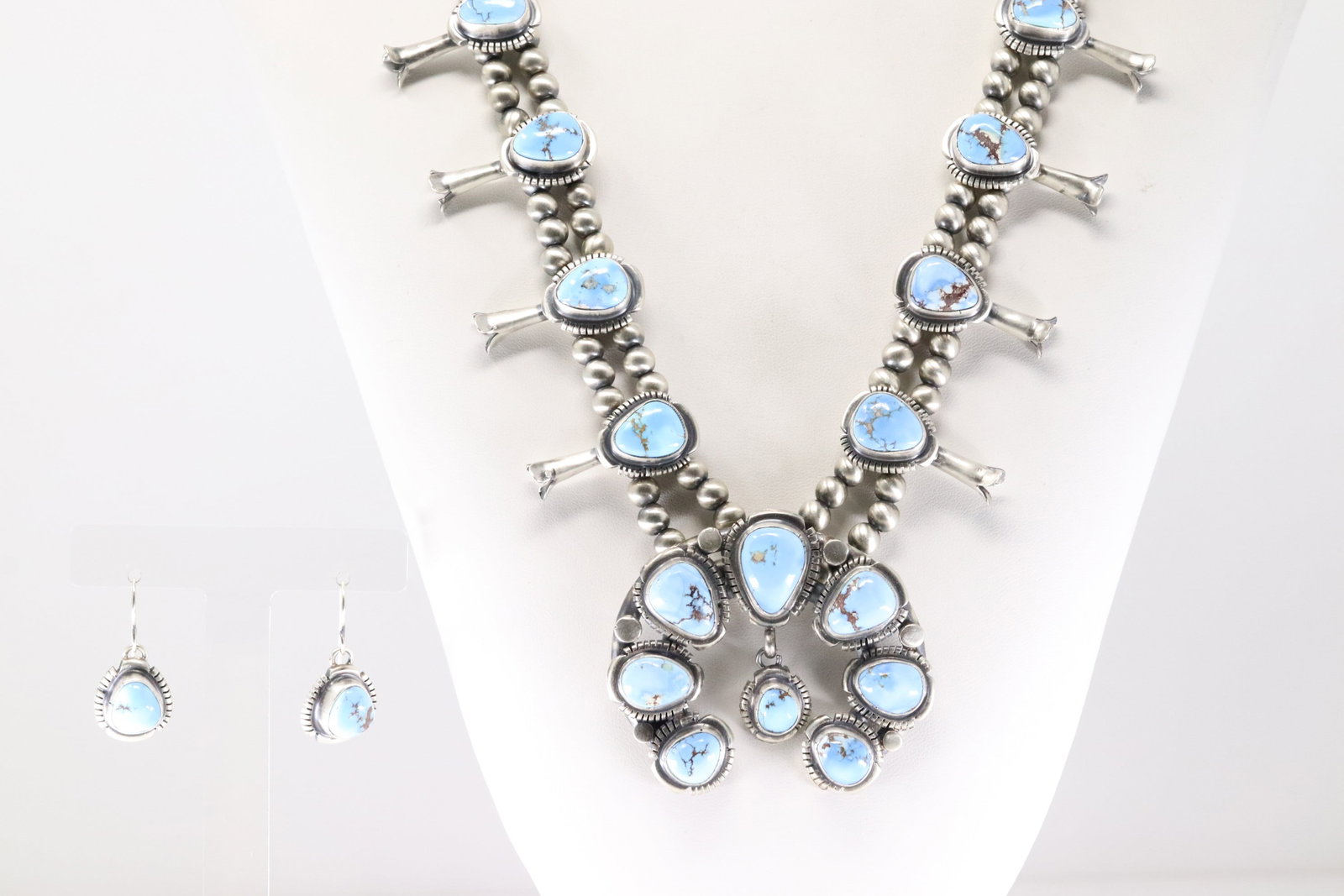 Native America Navajo Sterling Silver Golden Hill Turquoise Squash Blossom Necklace & Earring's Set: This is a Native America Navajo Sterling Silver Golden Hill Turquoise Squash Blossom Necklace & Earring's Set By Thomas Francisco. Necklace length: 26.00" Total weight: 136.80 Grams.