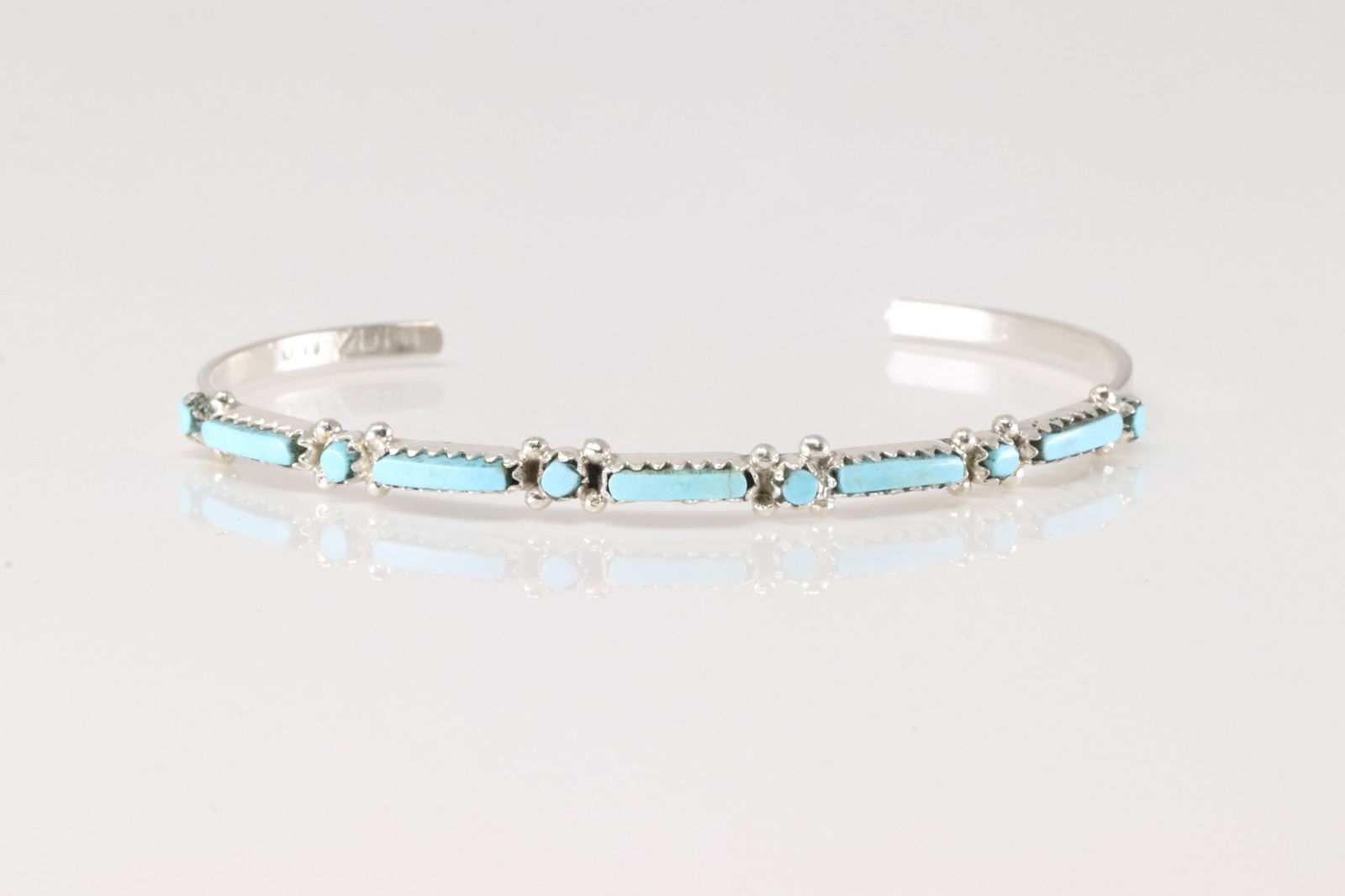 Native America Zuni Sterling Silver Turquoise Bracelet Cuff By J.W.: This is a Native America Zuni Sterling Silver Turquoise Bracelet Cuff By J.W.