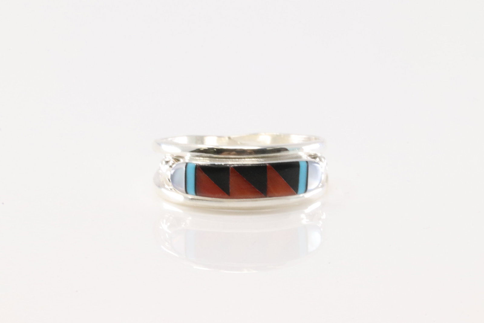 Native America Zuni Sterling Silver Multi-Color Inlay Ring By Joseph / Janice Cheama.: This is a Native America Zuni Sterling Silver Multi-Color Inlay Ring By Joseph / Janice Cheama. Ring size: 8.25.