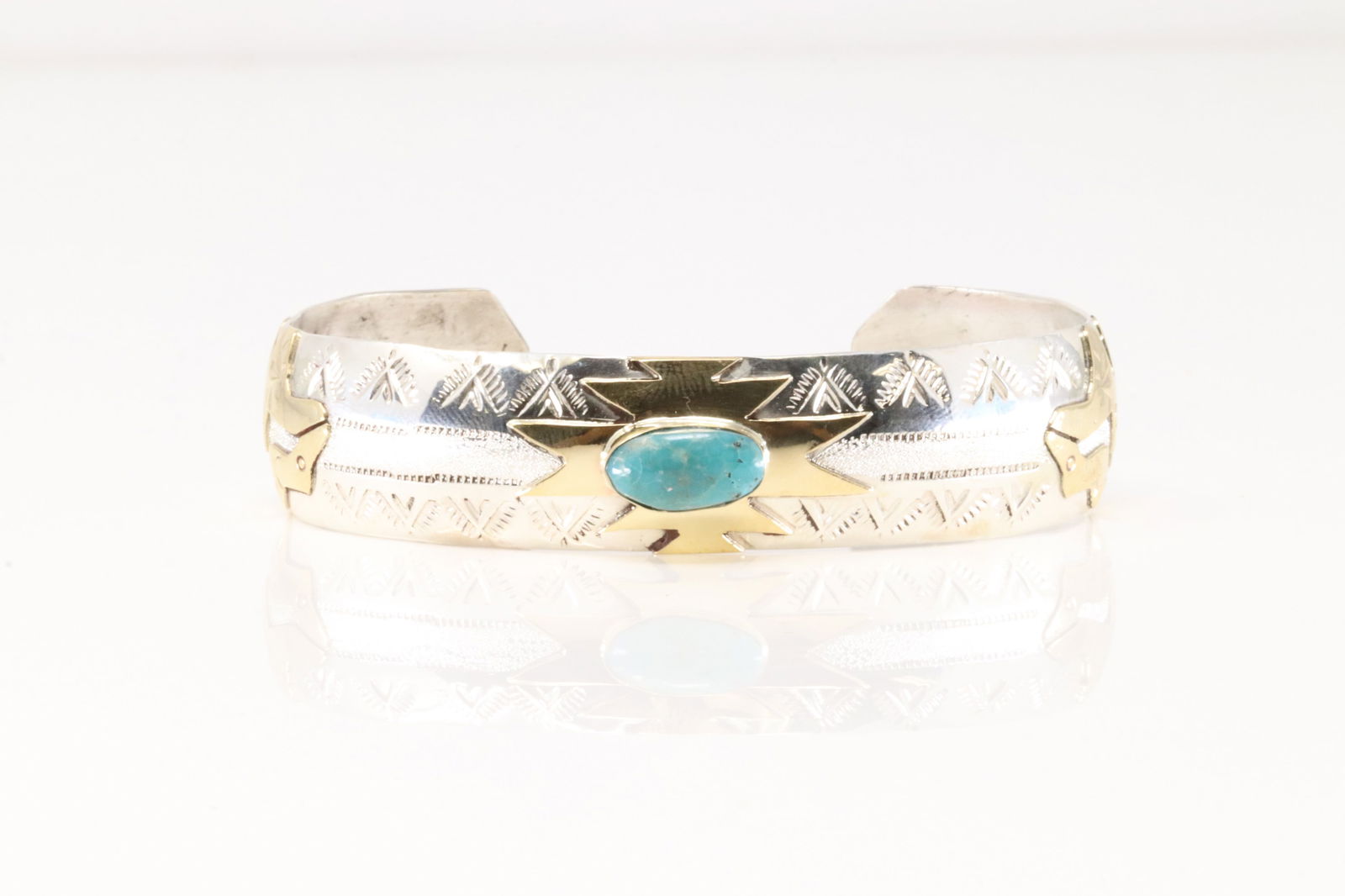 Native America Navajo Sterling Silver Turquoise Bracelet Cuff By G.J.: This is a Native America Navajo Sterling Silver Turquoise Bracelet Cuff By G.J.