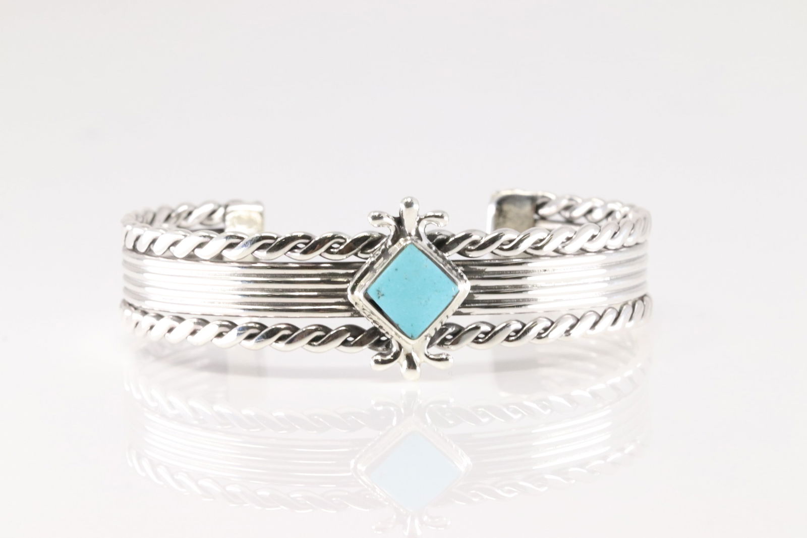 Native America Navajo Sterling Silver Turquoise Bracelet Cuff By Louise Joe.: This is a Native America Navajo Sterling Silver Turquoise Bracelet Cuff By Louise Joe.