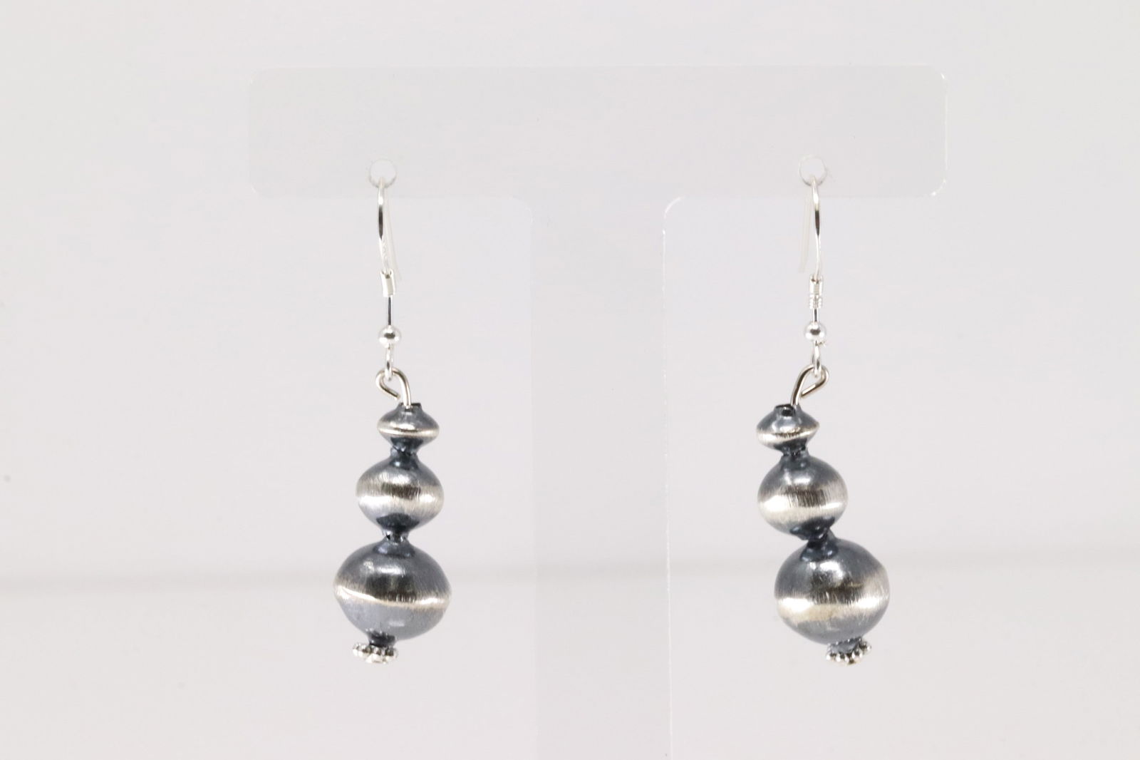 Native America Navajo Sterling Silver Pearl Beaded Dangling By Treva Jim.: This is a Native America Navajo Sterling Silver Pearl Beaded Dangling By Treva Jim.