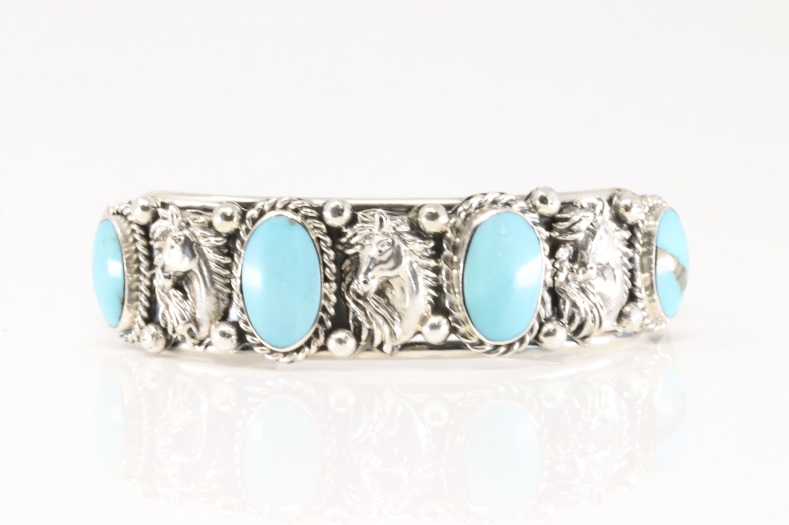 Native American Navajo Sterling Silver Turquoise Horse Bracelet Cuff By R.B.: This is a Native American Navajo Sterling Silver Turquoise Horse Bracelet Cuff By R.B.