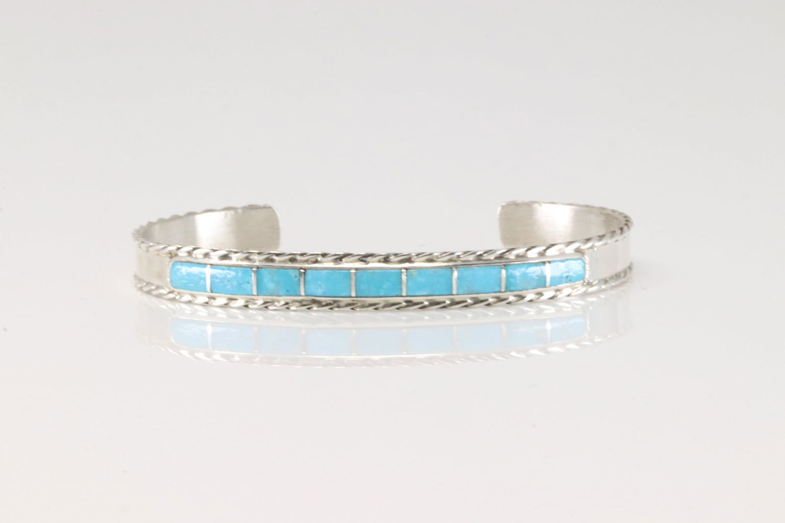 Native America Navajo Sterling Silver Turquoise Inlay Bracelet Cuff By J.P.: This is a Native America Navajo Sterling Silver Turquoise Inlay Bracelet Cuff By J.P.