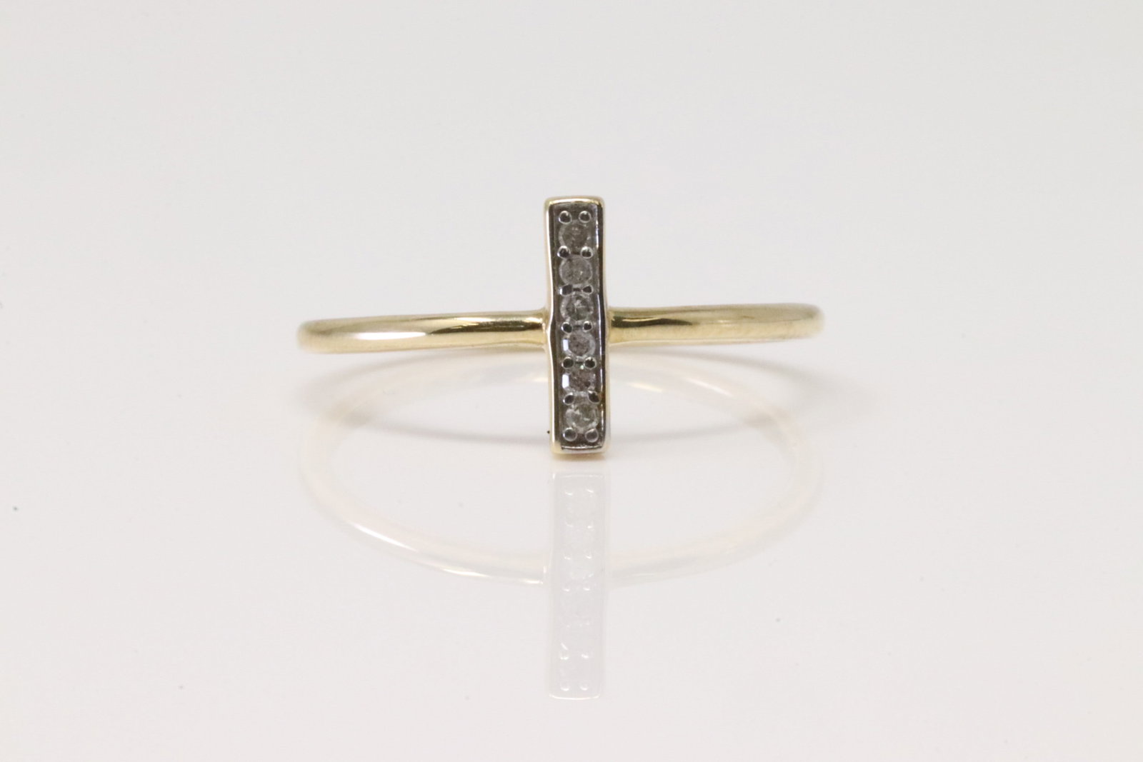 Diamond Ring 10Kt.: Ladies 10Kt Yellow Gold Diamond Ring. Ring has Diamonds. Diamonds weight: 0.06 ctw. Ring size: 7.00.