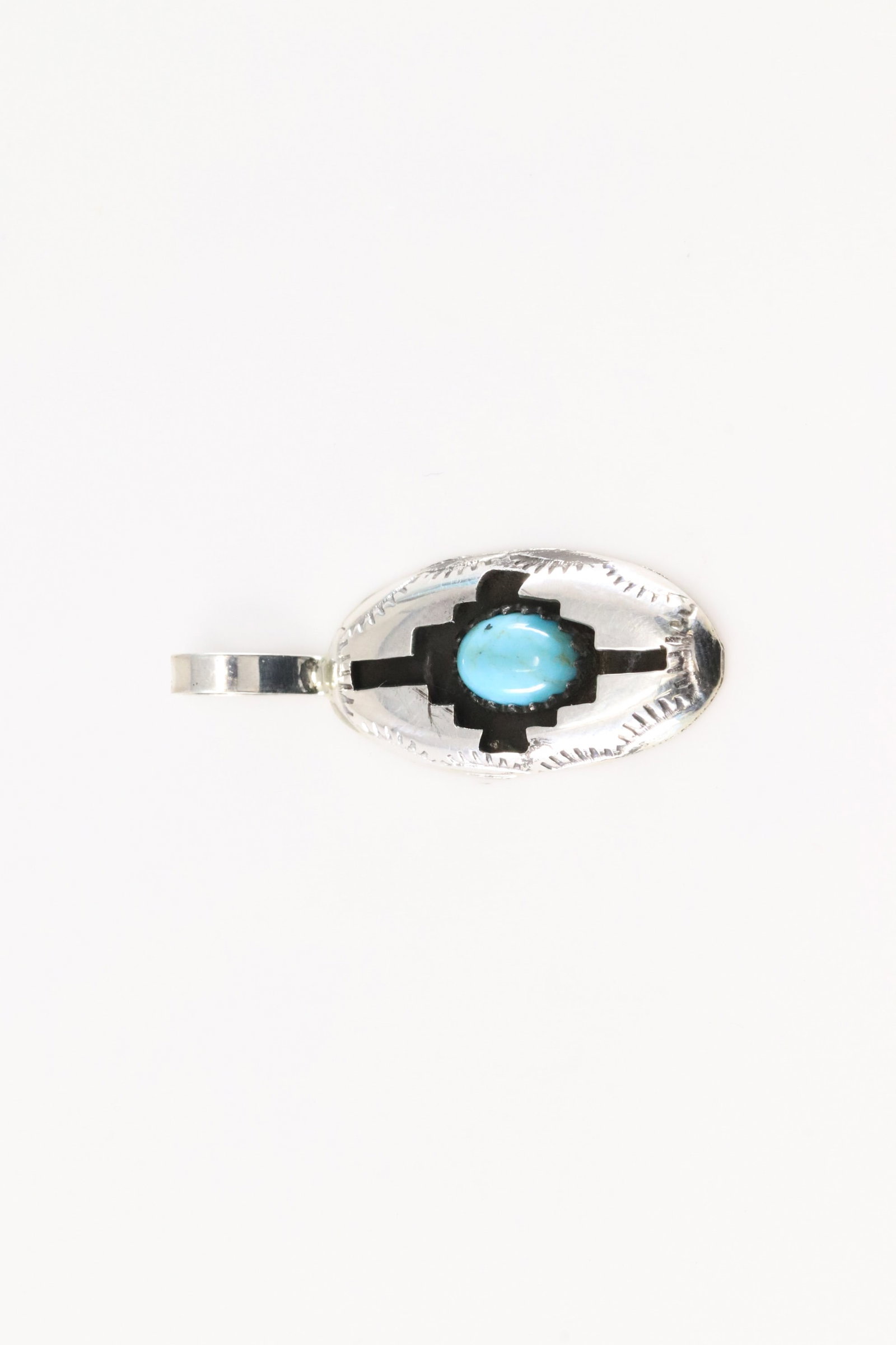 Native America Zuni Sterling Silver Turquoise Pendant By Felix Perry.: This is a Native America Zuni Sterling Silver Turquoise Pendant By Felix Perry.