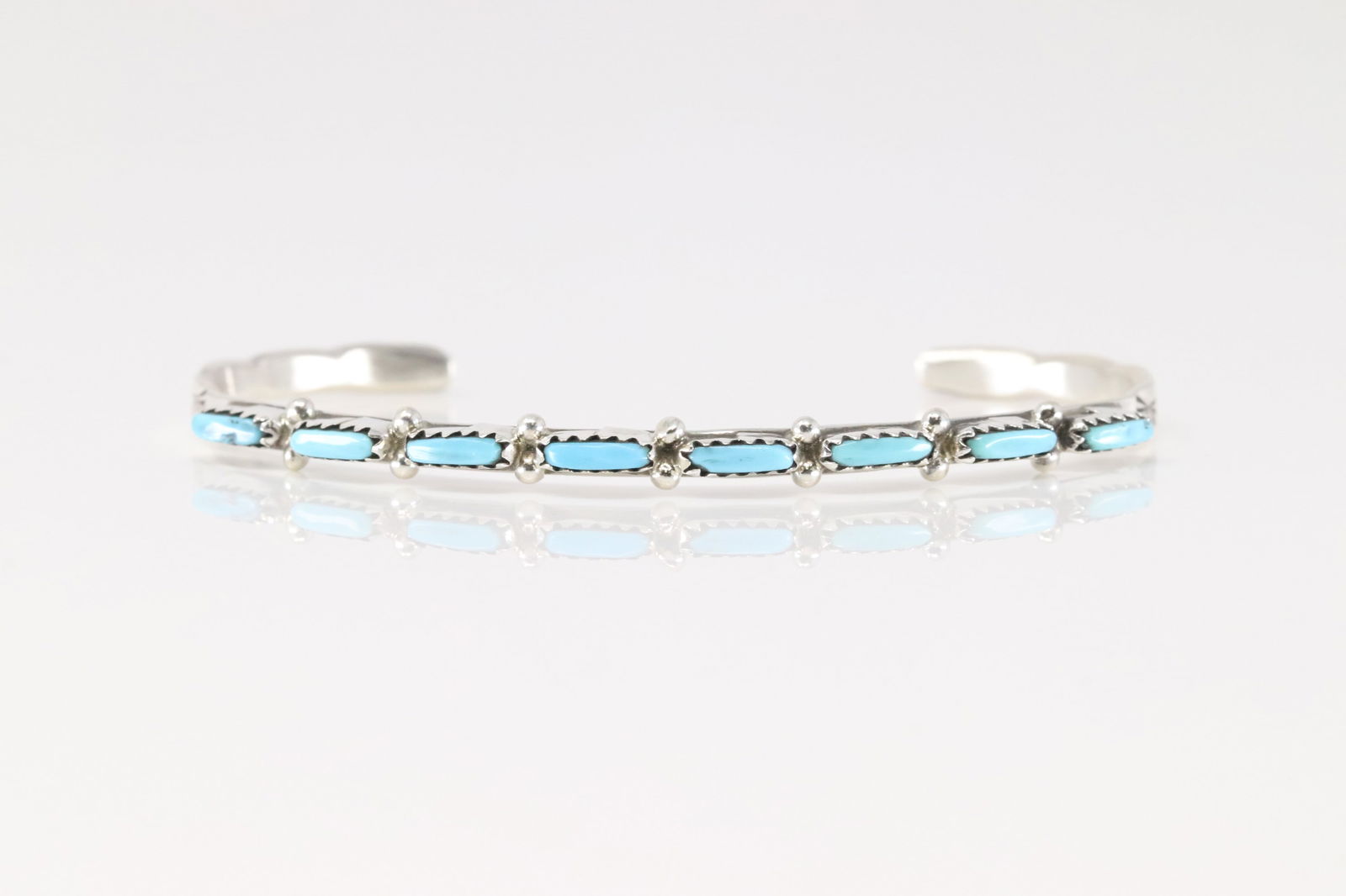 Native America Zuni Sterling Silver Turquoise Bracelet Cuff By Murray Hannaweeka.: This is a Native America Zuni Sterling Silver Turquoise Bracelet Cuff By Murray Hannaweeka.