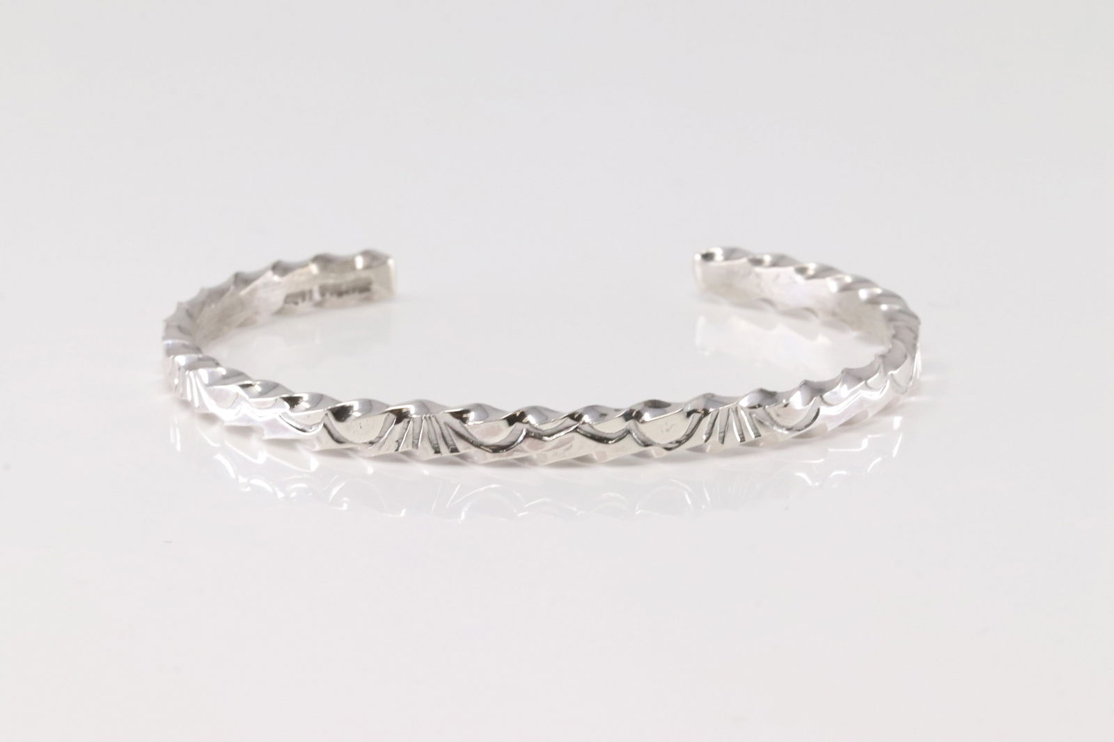 Native American Navajo Sterling Silver Solid Bracelet Cuff By Elaine Tahe.: This is a Native American Navajo Sterling Silver Solid Bracelet Cuff By Elaine Tahe.