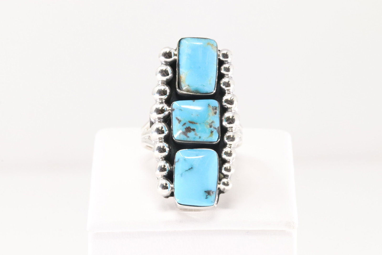 Native America Navajo Sterling Silver Turquoise Ring By Sadie Jim.: This is a Native America Navajo Sterling Silver Solid Turquoise Ring By Sadie Jim. Ring Size: 7.00.