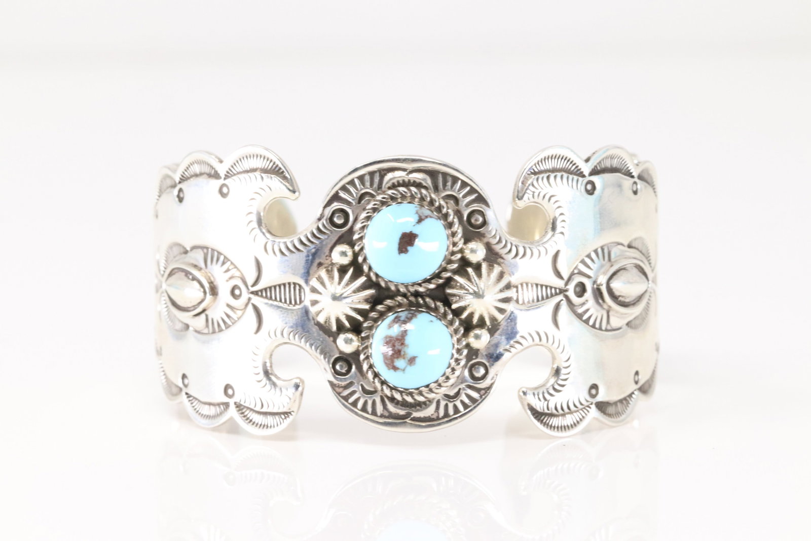 Native America Navajo Sterling Silver Turquoise Bracelet Cuff By Rolland Dixon.: This is a Native America Navajo Sterling Silver Turquoise Bracelet Cuff By Rolland Dixon. Total weight: 84.90 Grams.