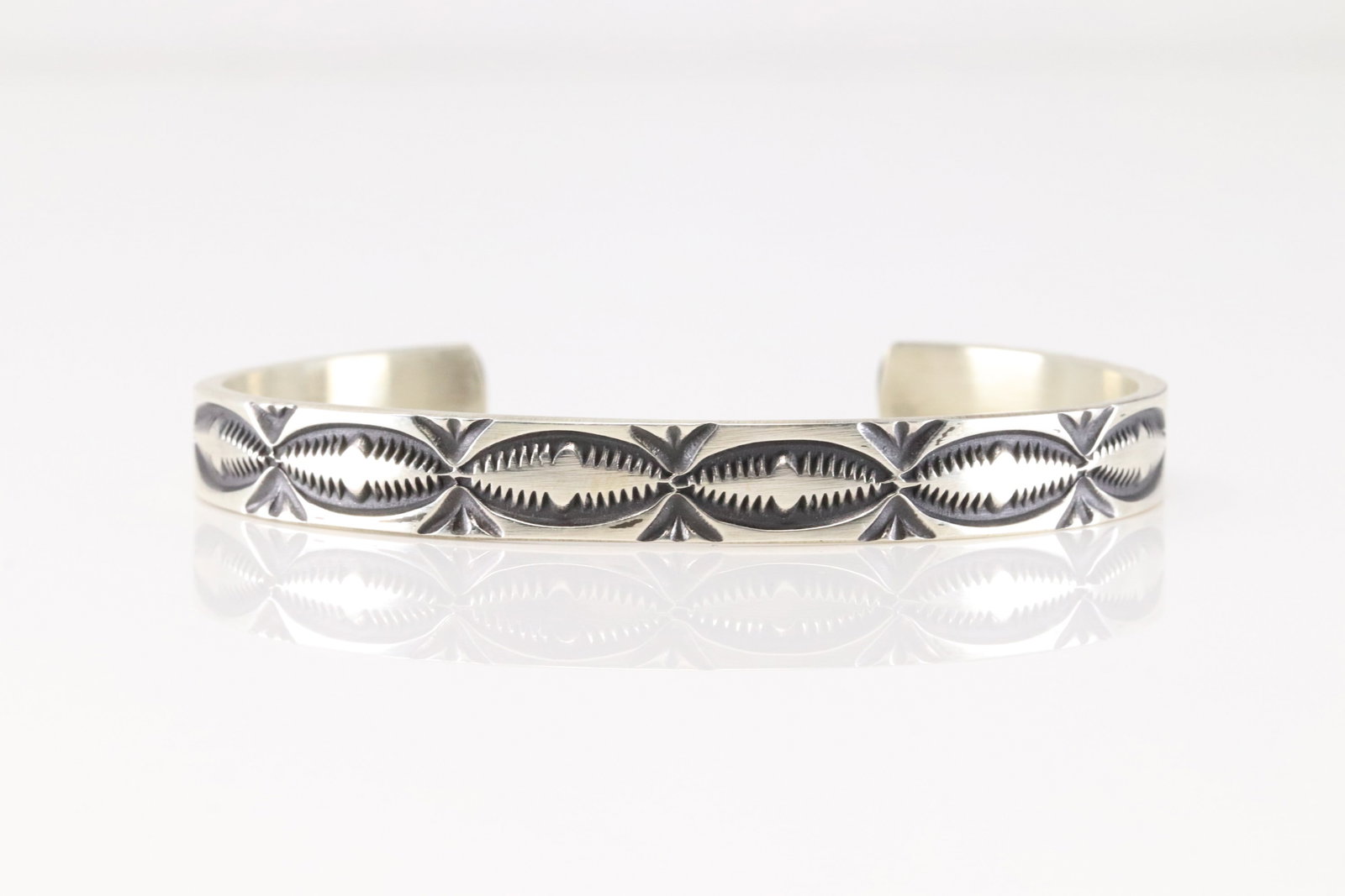 Native America Navajo Sterling Silver Solid Stamped Bracelet Cuff By Jerrold Tahe.: This is a Native America Navajo Sterling Silver Solid Stamped Bracelet Cuff By Jerrold Tahe.