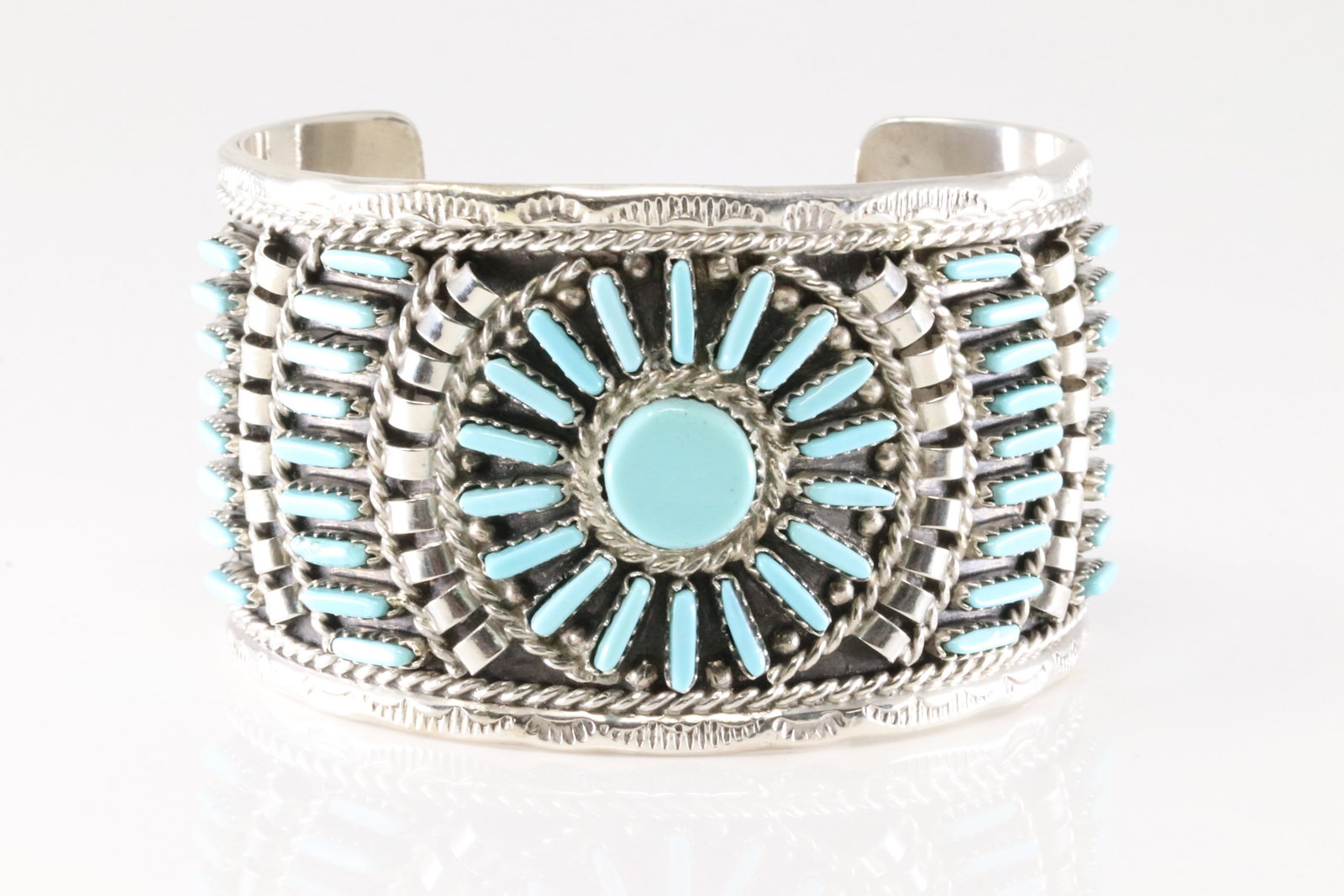 Native America Navajo Sterling Silver Turquoise Bracelet Cuff By Geraldine Fabe.: This is a Native America Navajo Sterling Silver Turquoise Bracelet Cuff By Geraldine Fabe. 53.70 Grams.