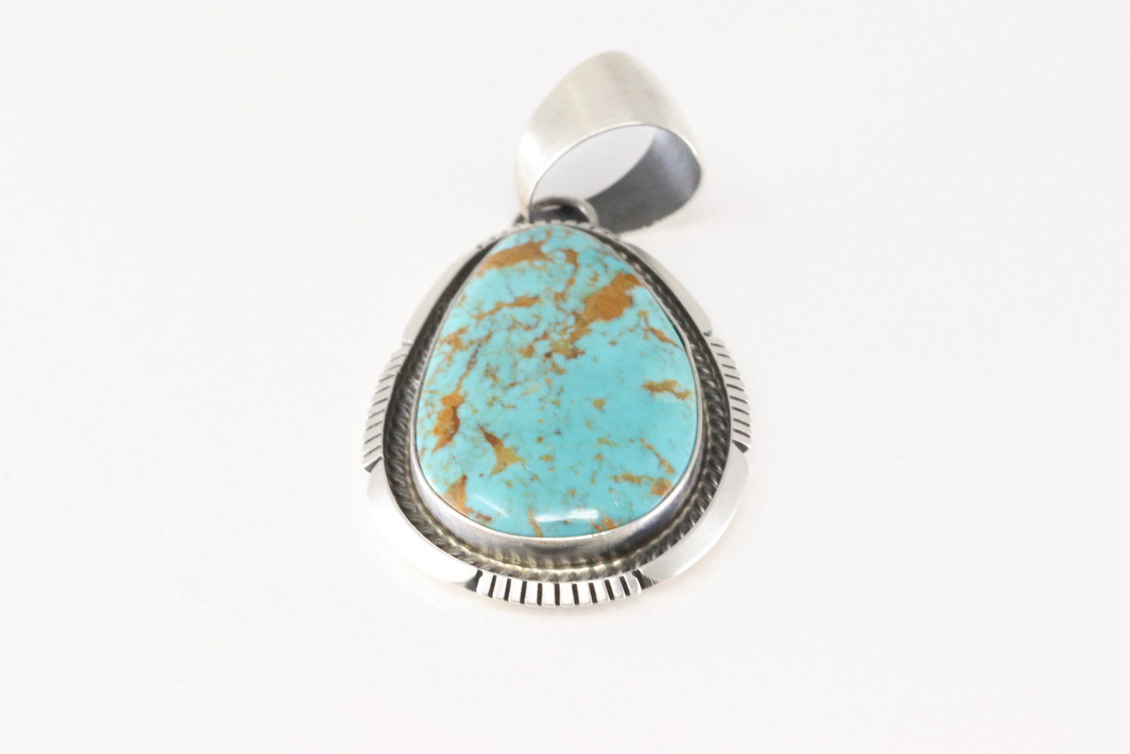 Native America Navajo Sterling Silver Kingman Turquoise Pendant By Alfred Martinez.: This is a Native America Navajo Sterling Silver Kingman Turquoise Pendant By Alfred Martinez.