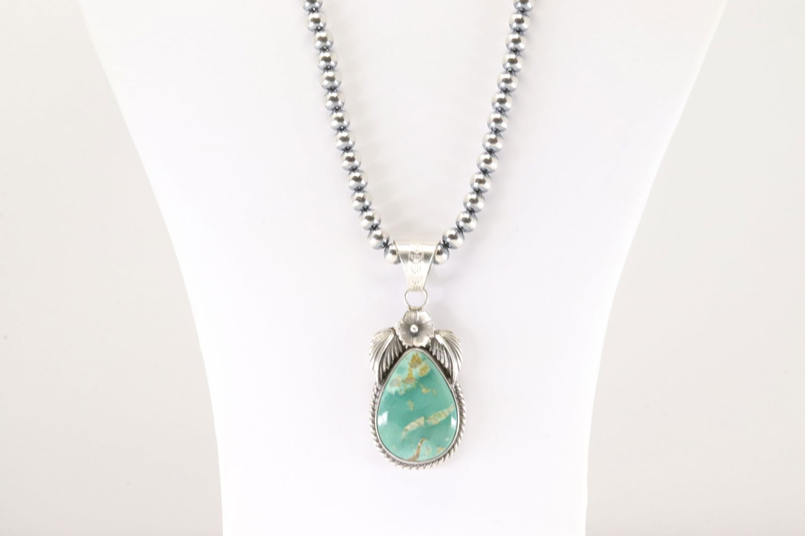 Native America Navajo Sterling Silver Kingman Turquoise Pendant By Jimson Belin. With Pearl Beaded: This is a Native America Navajo Sterling Silver Kingman Turquoise Pendant By Jimson Belin. With Pearl Beaded Sterling Silver Machine Made Necklace. Necklace length: 20.00"