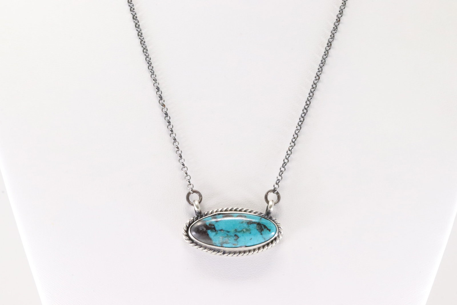 Native America Navajo Sterling Silver Campitos Turquoise Necklace By Johnny Dixon.: This is a Native America Navajo Sterling Silver Campitos Turquoise Necklace By Johnny Dixon. Necklace length: 18.00"