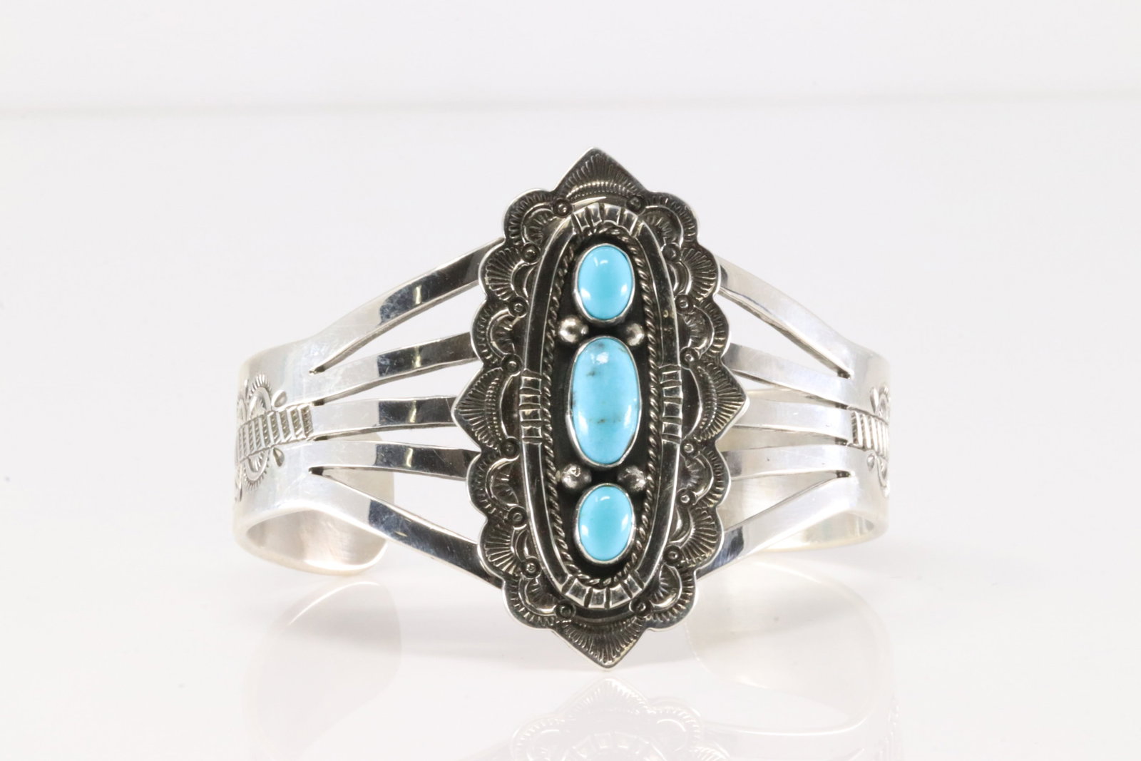 Native American Navajo Sterling Silver Kingman Turquoise Bracelet Cuff By E.Wylie.: This is a Native American Navajo Sterling Silver Kingman Turquoise Bracelet Cuff By E.Wylie.