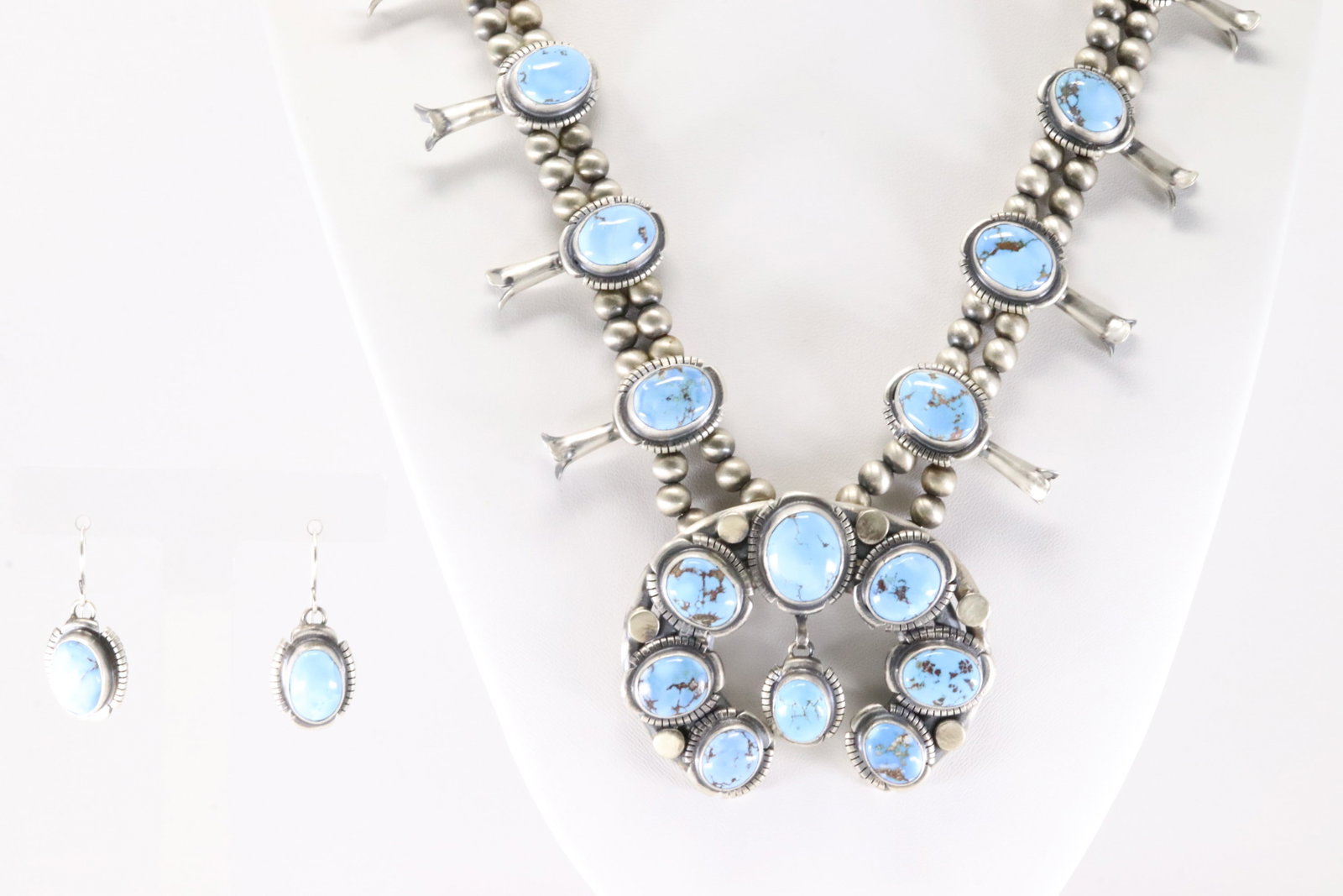 Native America Navajo Sterling Silver Golden Hill Turquoise Squash Blossoom Necklace & Earring's Set: This is a Native America Navajo Sterling Silver Golden Hill Turquoise Squash Blossoom Necklace & Earring's Set By Thomas Francisco. Necklace length: 26.00" Total weight: 148.60 Grams.