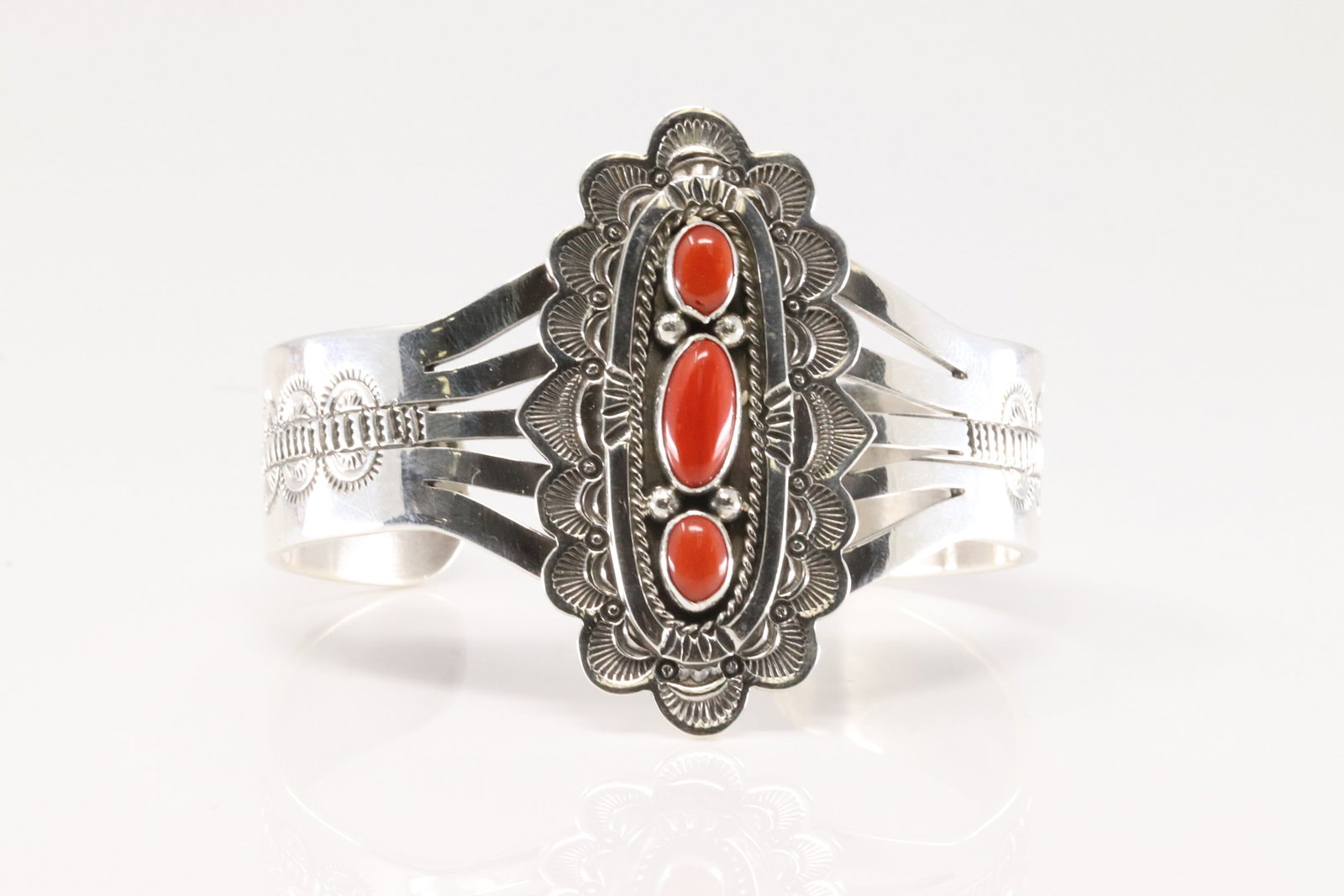 Native America Navajo Sterling Silver Coral Bracelet Cuff By Eula Wylie.: This is a Native America Navajo Sterling Silver Coral Bracelet Cuff By Eula Wylie.