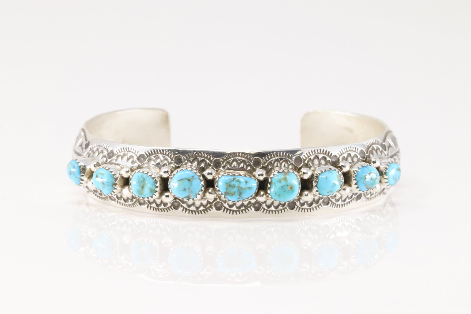 Native America Navajo Sterling Silver Turquoise Bracelet Cuff By Grace Silver.: This is a Native America Navajo Sterling Silver Turquoise Bracelet Cuff By Grace Silver.