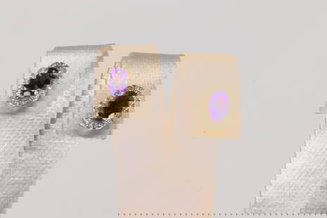 Amethyts & Diamond Stud Earring By 10Kt.: Ladies 10Kt Yellow Gold Amethyts & Diamond Stud Earring. This Charming Stud Earring's has Purple Amethyts with Sparkling Diamonds. Diamonds weight: 0.15ctw.