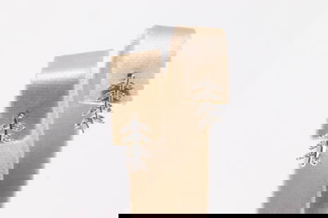 Diamond Hoop Earring 10Kt.: Ladies 10Kt White Gold Hoop Diamond Earring. This Charming Hoop Leaf Earring's has 32 round Diamonds. Diamonds weight: 0.13ctw.