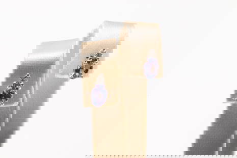 Tanzanite & Diamond Stud Earring 10Kt.: 10Kt Rose Gold Tanzanite & Diamond Stud Earring. This Stud Earring's has Oval Tanzanite Gems with 2 Sparkling Diamonds. Diamonds weight: 0.02ctw. Tanzanite weight: 1.38ctw.