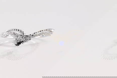 Sapphire & Diamond Ring 14Kt.: Ladies 14Kt White Gold Sapphire & Diamond Ring. This Elegant Ring has Blue sapphire with Baguette & Round Diamonds. Diamonds weight: 0.16ctw. Sapphire weight: 0.05ctw. Ring size: 6.50. Total weight: