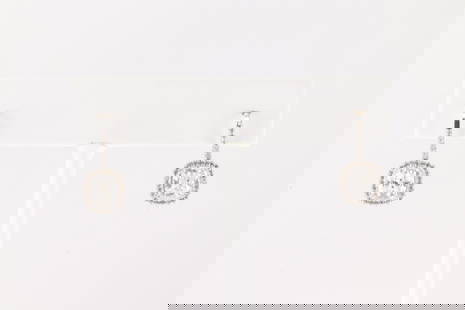 Diamond Open Hoop Earring 18Kt.: Ladies 18Kt White Gold Diamond Open Hoop Earring. This Charming Open Hoop Earring's has 2 Brilliants Princess Cut Diamodns / Surrender by round Sparkling Diamonds. Diamonds weight approx: 2.00 ctw