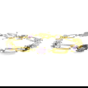 Amethyst & Diamond Bracelet 10Kt. This elegant bracelet features stunning amethyst gemstones set in: Amethyst & Diamond Bracelet 10Kt. This elegant bracelet features stunning amethyst gemstones set in a delicate gold chain. The vibrant purple stones are beautifully complemented by 14 Sparklin