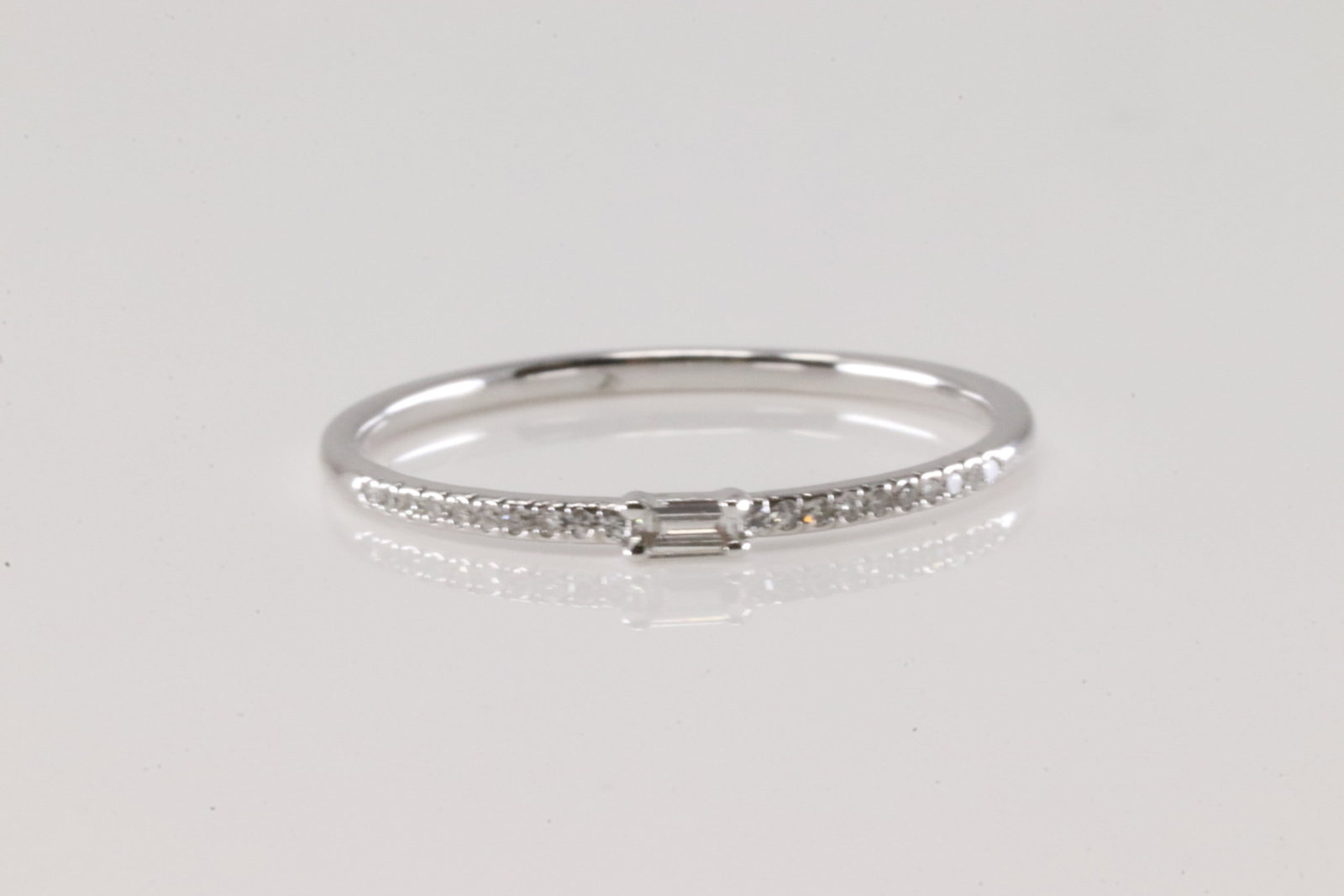 Diamond Ring 14Kt.: Ladies 14Kt White Gold Diamond Ring. This Ring has 21 Sparkling Diamonds. Diamonds weight: 0.09ctw. Ring size: 6.50.