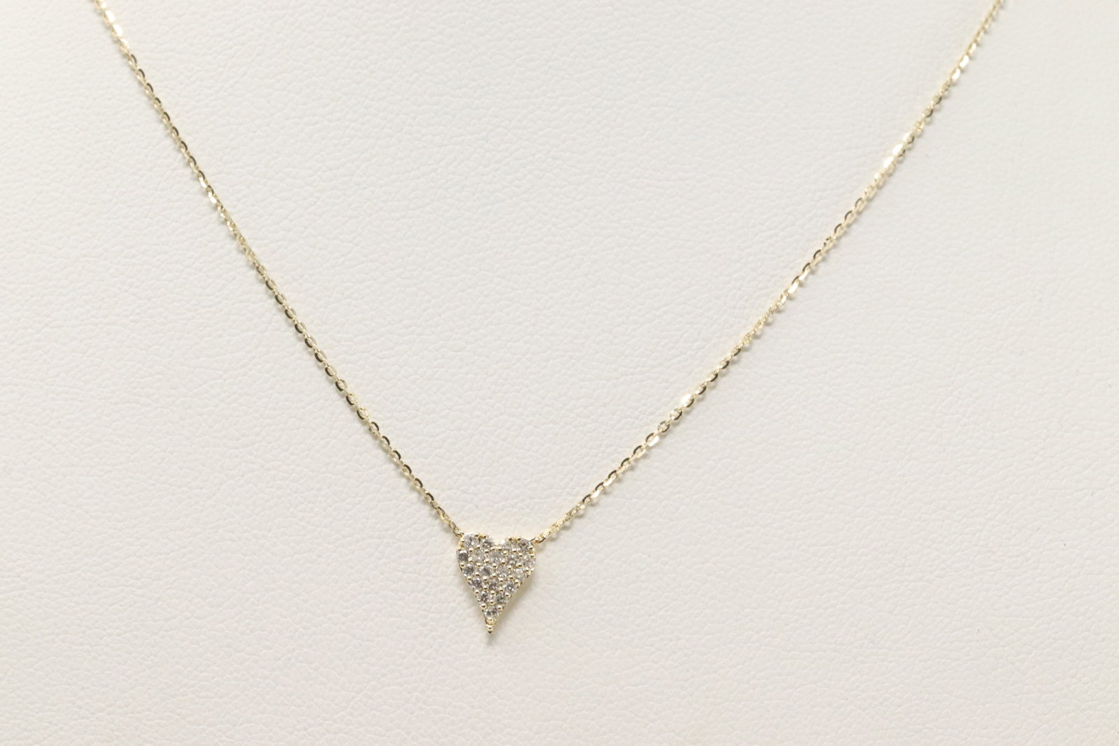 Diamond Heart Pendant / Necklace 14Kt.: 14Kt Yellow Gold Diamond Heart Pendant / Necklace. This Pendant has Heart Design with 20 Saprkling Diamonds and A 14K Necklace. Diamonds weight:0.16ctw. Necklace length: 18.00"