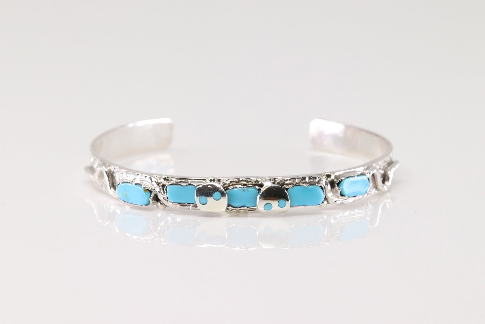 Native America Zuni Sterling Silver Turquoise Bracelet Cuff By Joy Calabaza.: This is a Native America Zuni Sterling Silver Turquoise Bracelet Cuff By Joy Calabaza.