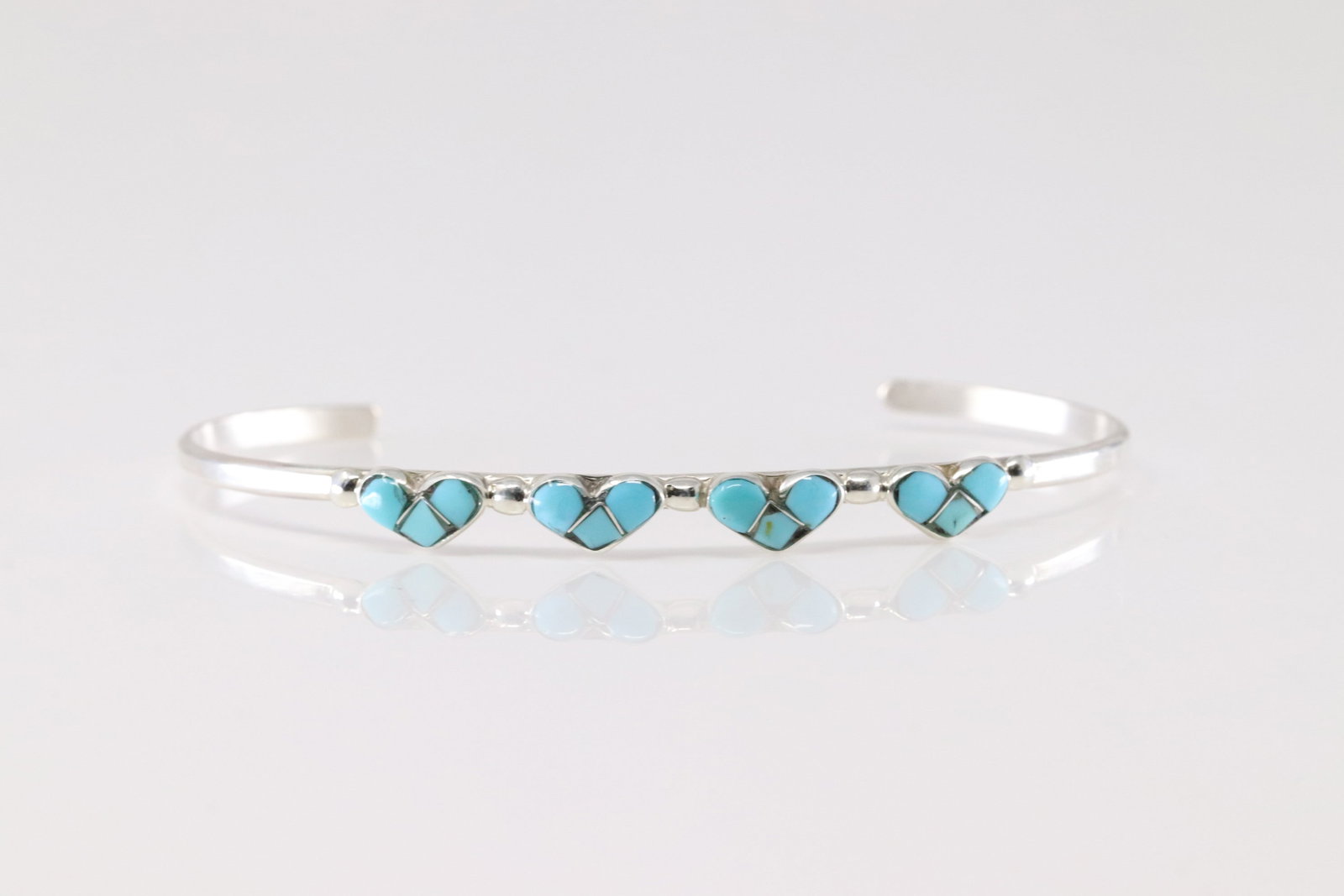 Native America Zuni Sterling Silver Turquoise Heart Inlay Bracelet Cuff.: This is a Native America Zuni Sterling Silver Turquoise Heart Inlay Bracelet Cuff.