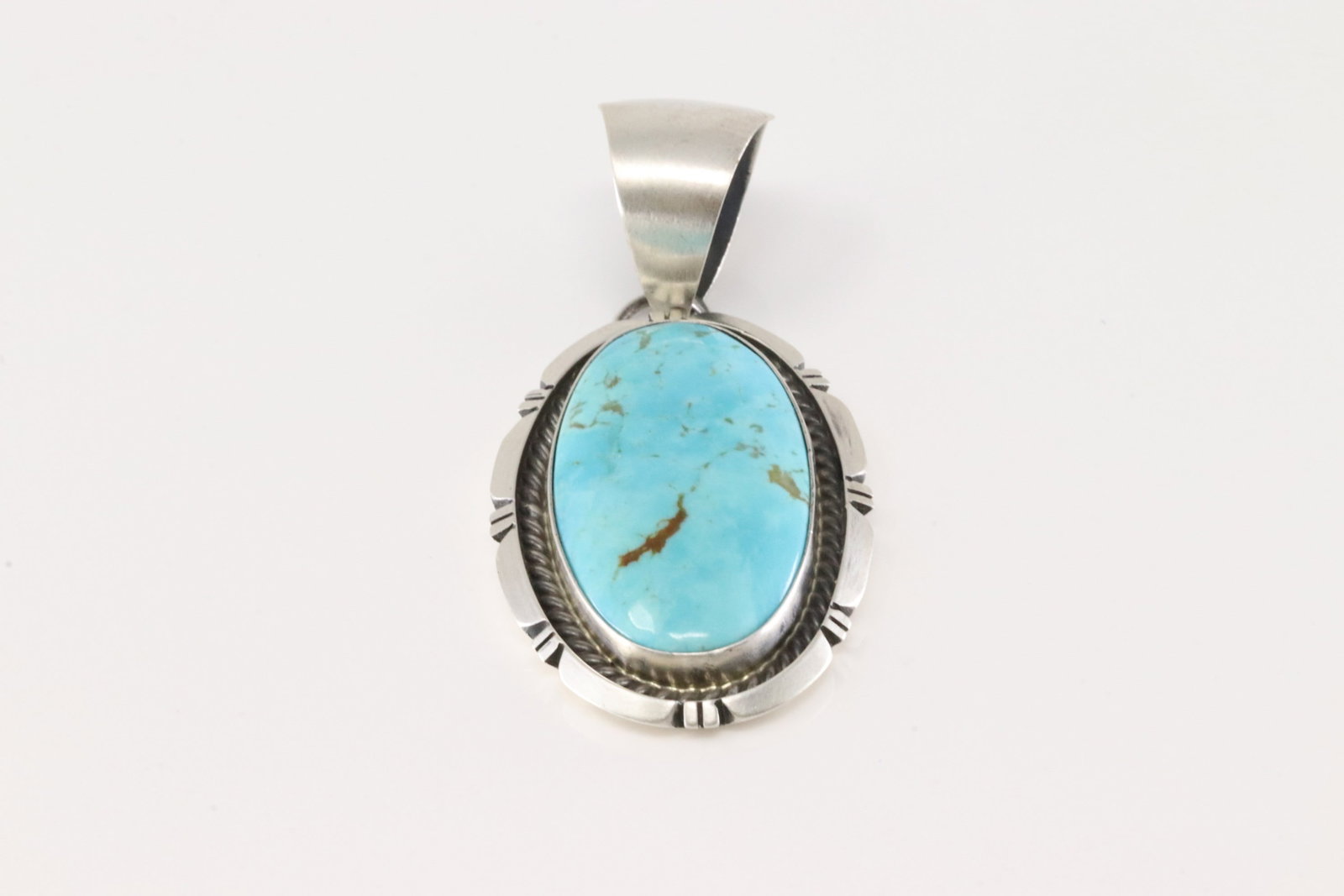 Native America Navajo Sterling Silver Kingman Turquoise Pendant By Alfred Martinez.: This is a Native America Navajo Sterling Silver Turquoise Post Dangling Earring's By Sharon McCarthy.