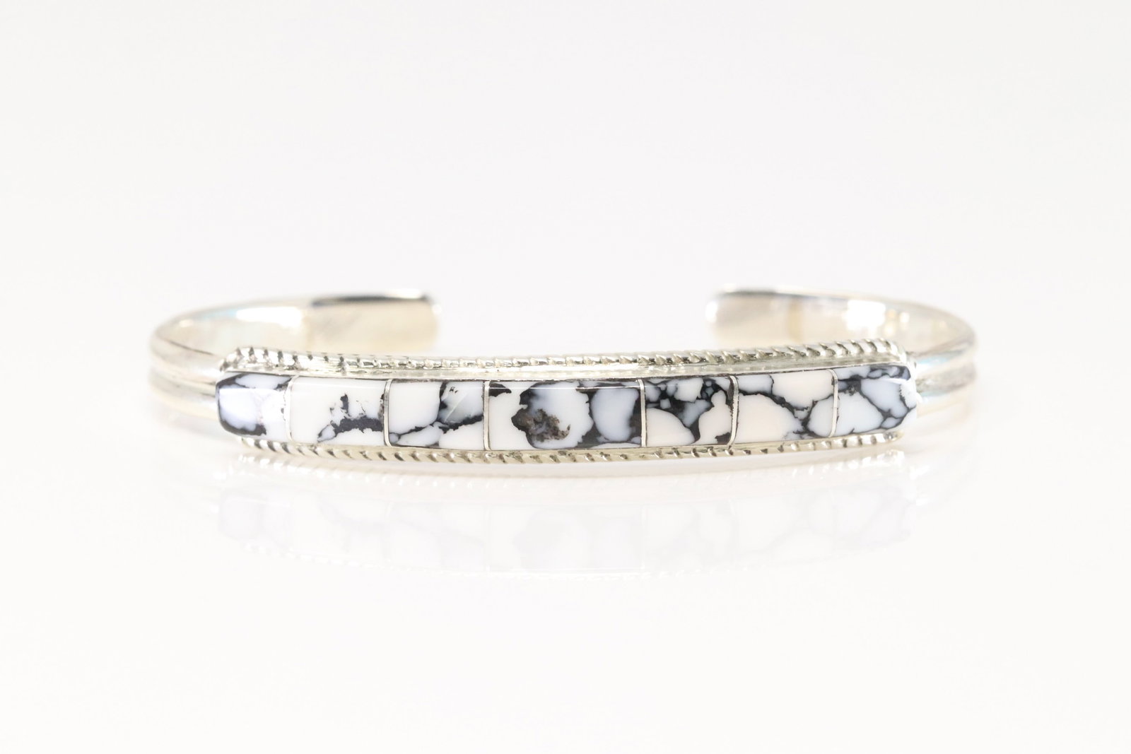 Native America Zuni Sterling Silver White Buffalo Inlay Bracelet Cuff By Roland Natachu.: This is a Native America Zuni Sterling Silver White Buffalo Inlay Bracelet Cuff By Roland Natachu.