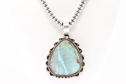 Native American Navajo Sterling Silver Number 8 Turquoise Pendant By Juanita McDonald. With Pearl