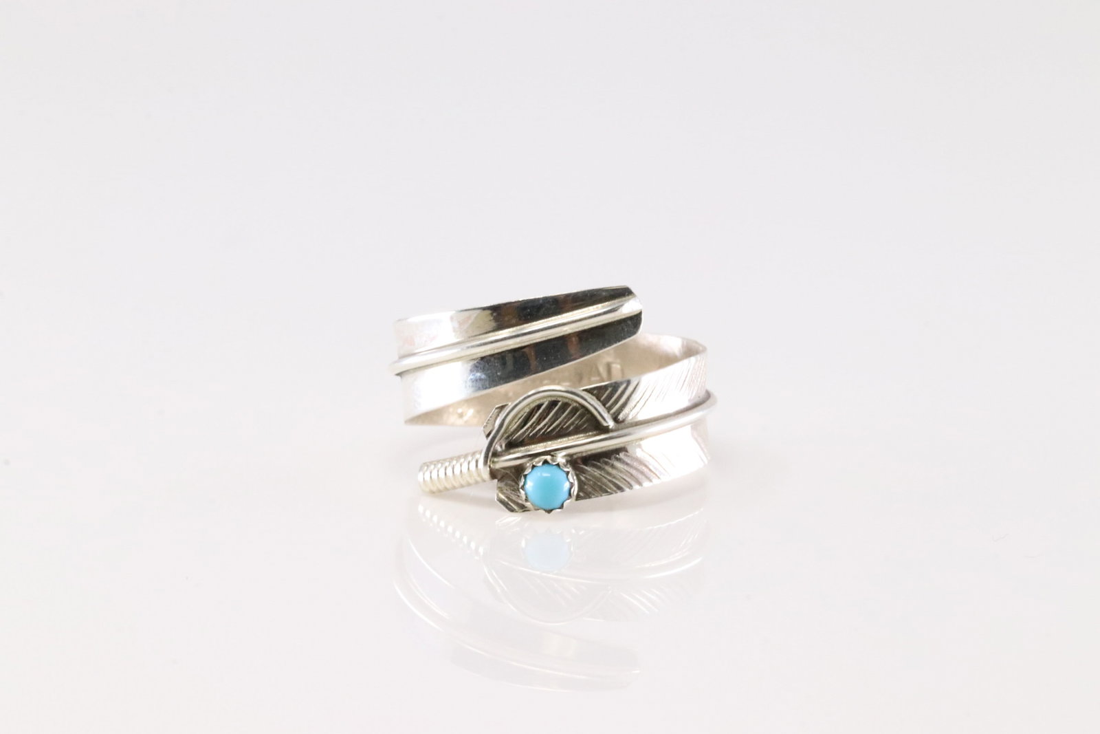Native America Navajo Sterling Silver Turquoise Feather Ring By Aaron Davis.: This is a Native America Navajo Sterling Silver Turquoise Feather Ring By Aaron Davis. 8.00.