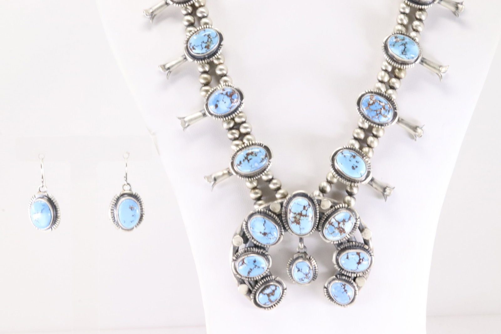 Native America Navajo Sterling Silver Golden Hill Turquoise Squash Blossom Necklace & Earring's Set: This is a Native America Navajo Sterling Silver Golden Hill Turquoise Squash Blossom Necklace & Earring's Set By Thomas Francisco. Necklace length: 26.00" Total weight: 154.30 Grams.